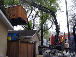 boomtruck lifting the House